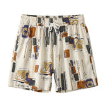 Ivory abstract print drawstring summer shorts with elastic waistband on a white background.