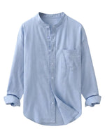 Light blue button-up shirt on a gray background