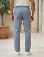 Light blue men’s relaxed waist trousers with clean straight fit back view