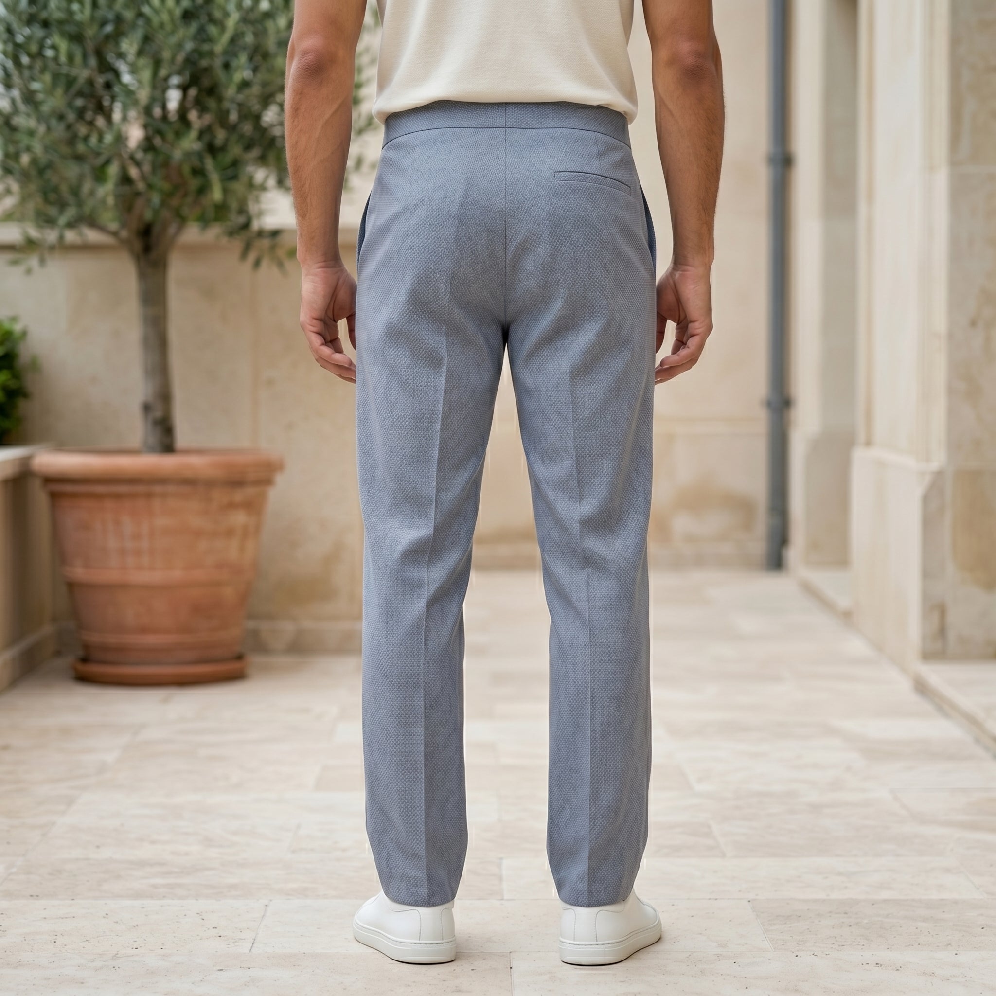 Light blue men’s relaxed waist trousers with clean straight fit back view