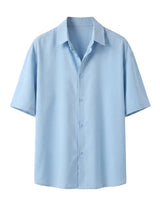 Light blue short-sleeve shirt on a light gray background