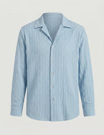 Light blue striped shirt on a gray background