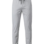 Light gray jogger pants with elastic waistband and tapered legs on a white background.