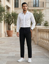Man wearing a black men’s pleated tailored pants with clean front closure and straight fit