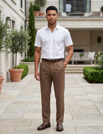 Man wearing a brown men’s pleated pocketed trousers with button waistband