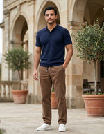 Man wearing a brown men’s ribbed drawstring pants with elastic waistband and side pockets