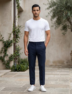 Man wearing a navy men’s pocketed tailored trousers with clean straight fit