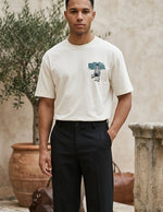 Cream white men’s cotton crew neck T-shirt with small chest graphic