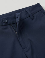 Navy blue men’s stretch straight-leg trousers close-up details