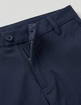 Navy blue men’s stretch straight-leg trousers close-up details