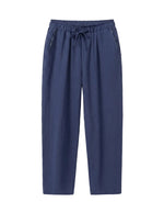Navy blue pants on a white background