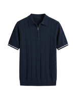 Navy blue polo shirt with white trim on a white background