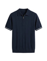Navy blue polo shirt with white trim on a white background
