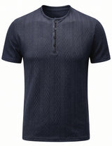 Navy blue textured short-sleeve henley shirt on a white background