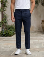 Navy men’s pocketed tailored trousers with clean straight fit bottom