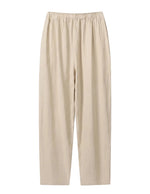 Beige pants on a light gray background