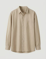 Beige button-up shirt on a light gray background
