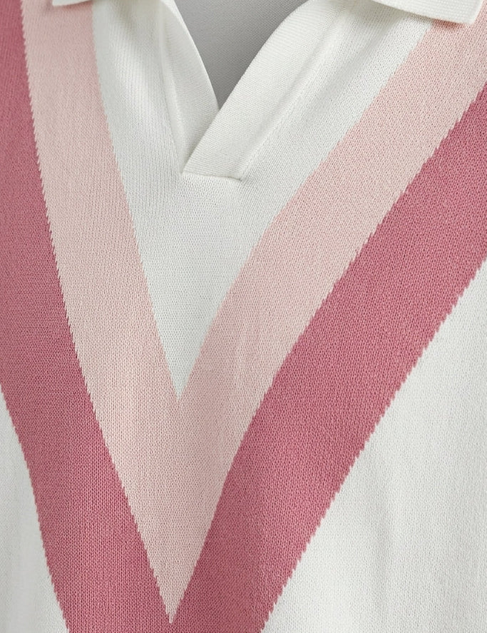 Rosato - White shirt with a pink and red striped sweater over it on a gray background