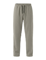 Sage green men’s lightweight drawstring pants with tapered leg and side pockets