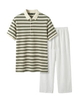 Striped polo shirt and white pants on a white background
