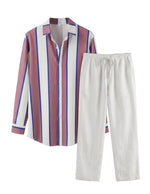 Striped shirt and white pants on a gray background