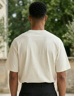 Top back - Cream white men’s cotton crew neck T-shirt with small chest graphic