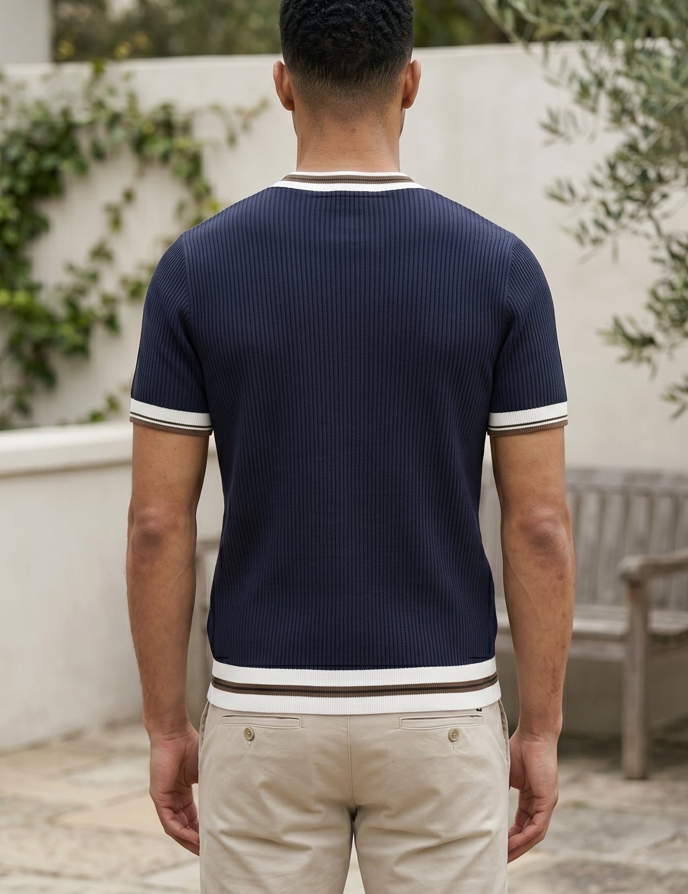 Top back - Navy blue men’s ribbed knit T-shirt with white and brown trim
