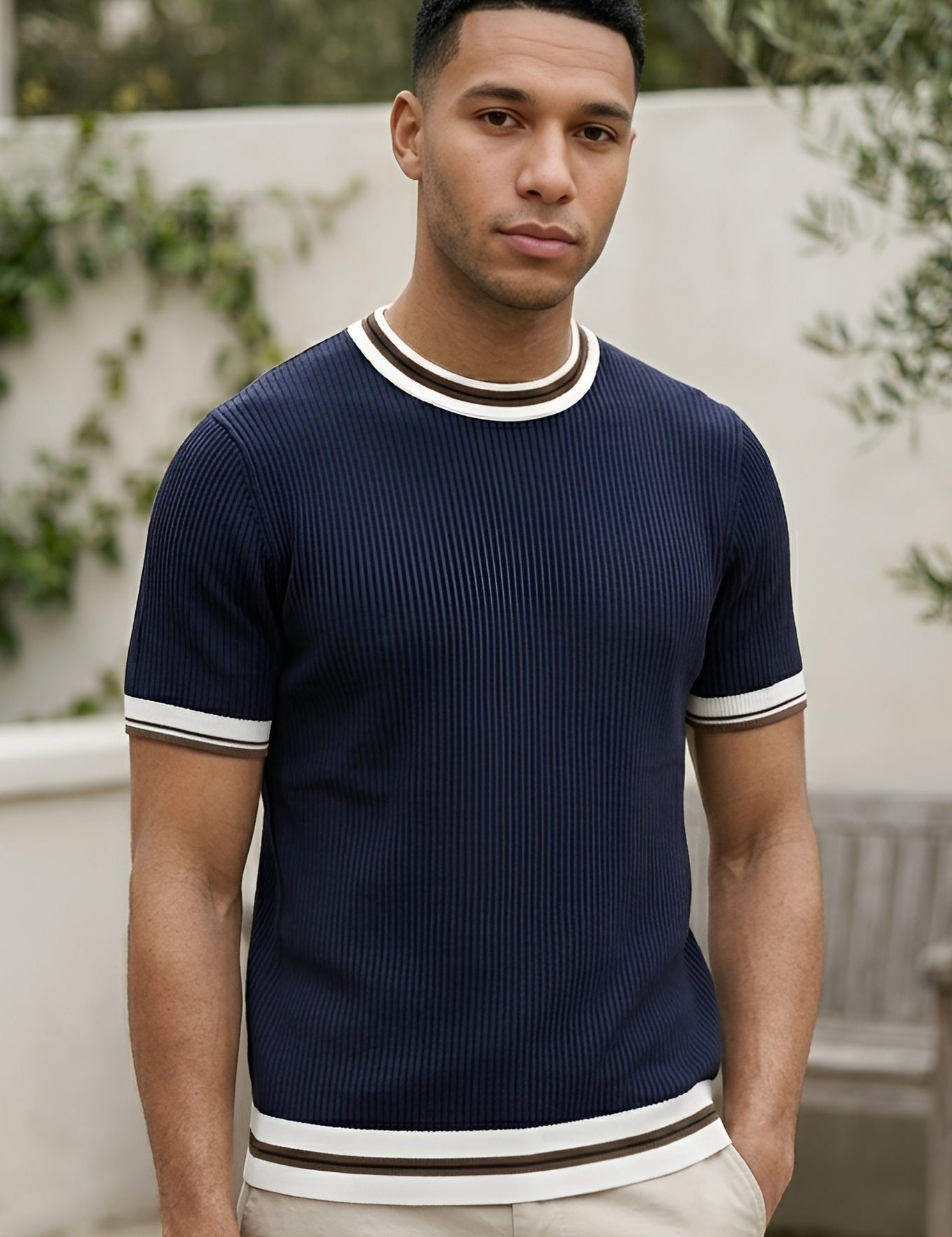 Upper body - Navy blue men’s ribbed knit T-shirt with white and brown trim

