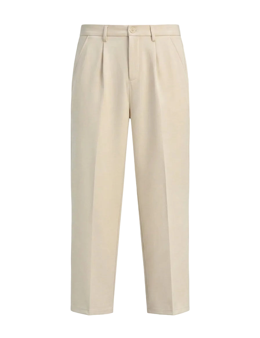 Verde Knit - Beige pants on a light gray background