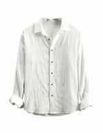 White button-up shirt on a white background