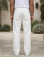 White men’s ribbed straight-leg trousers with pockets and button waistband back view