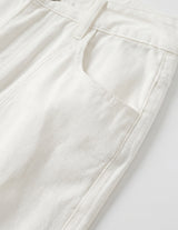 White men’s ribbed straight-leg trousers with pockets and button waistband close-up