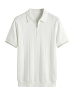 White polo shirt on a light gray background