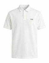 White polo shirt with a small logo on a white background