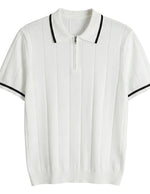 White polo shirt with black trim on a light gray background