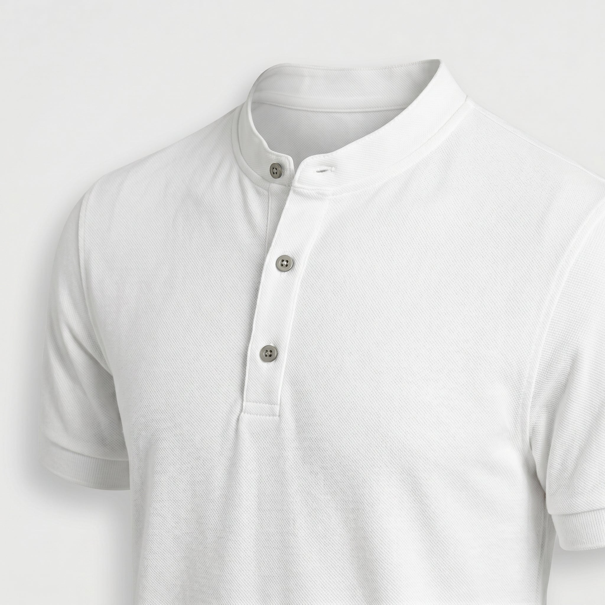 White short-sleeve shirt with button details on a light gray background