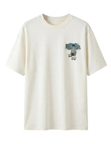 White t-shirt with a graphic design on a light gray background