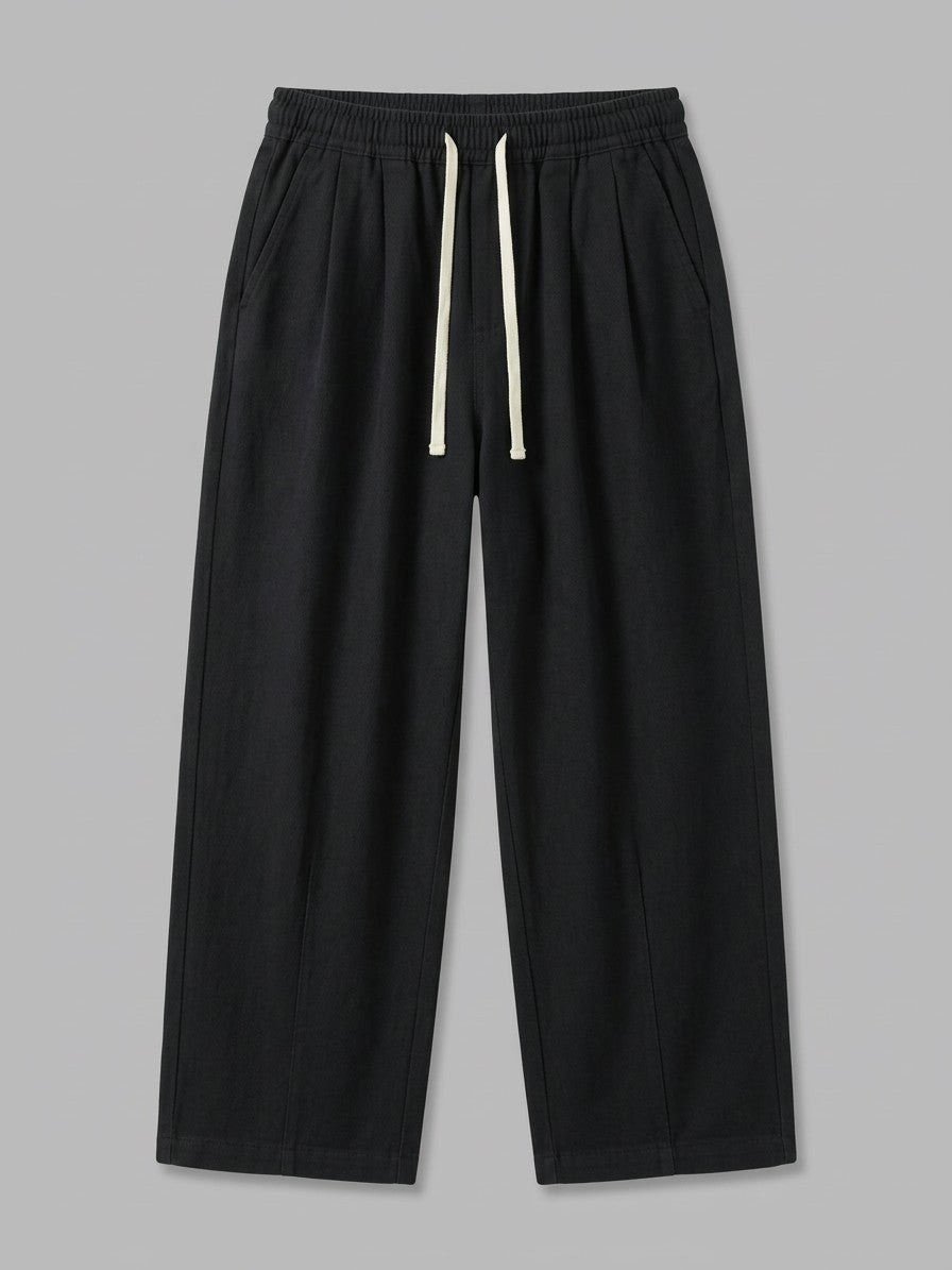 Anzio Men's Pleat-Front Cotton Twill Drawstring Pants — black — packshot