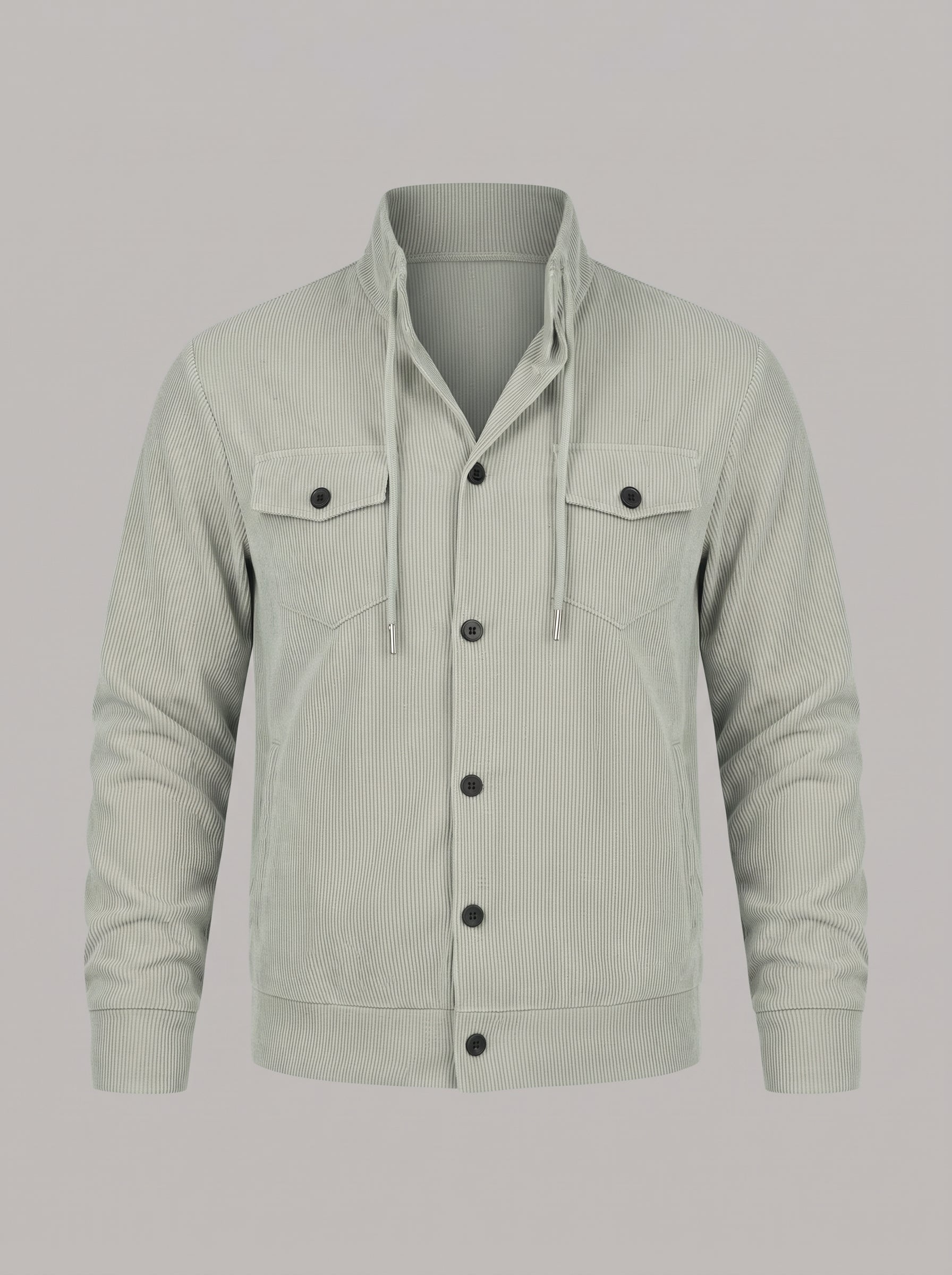 A light sage green corduroy jacket with a stand-up collar, drawstring, and snap-button front, displayed on a neutral gray background.