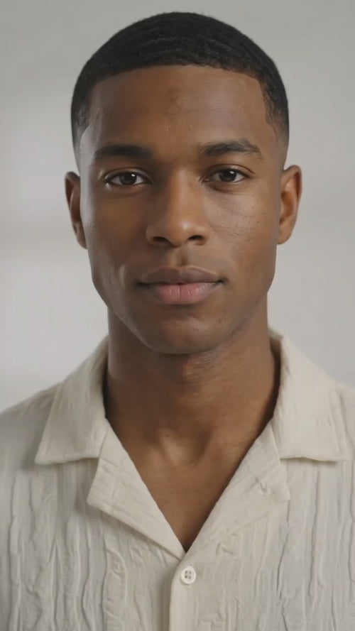 Top Model wearing an ivory shirt with drawstring pants in a video