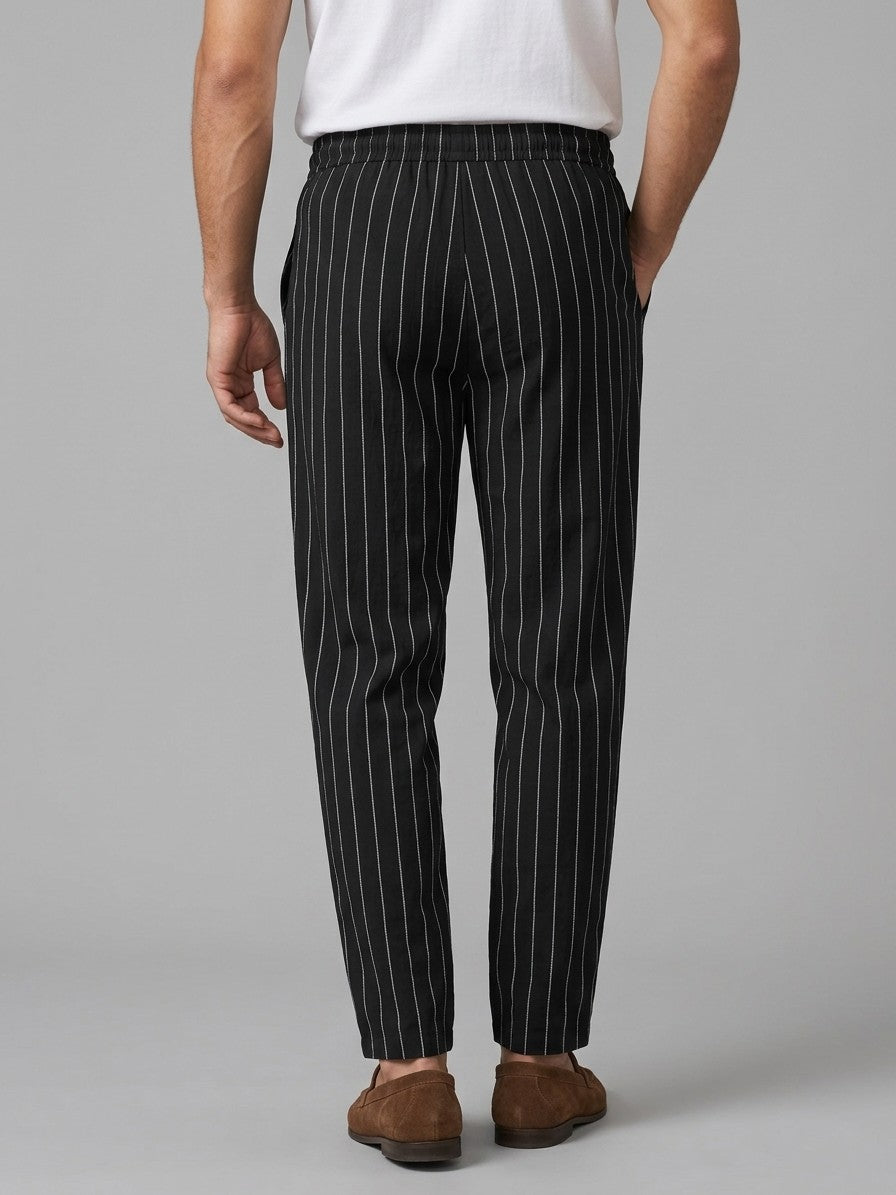 Varen Men's Pinstripe Drawstring Trousers — black — back