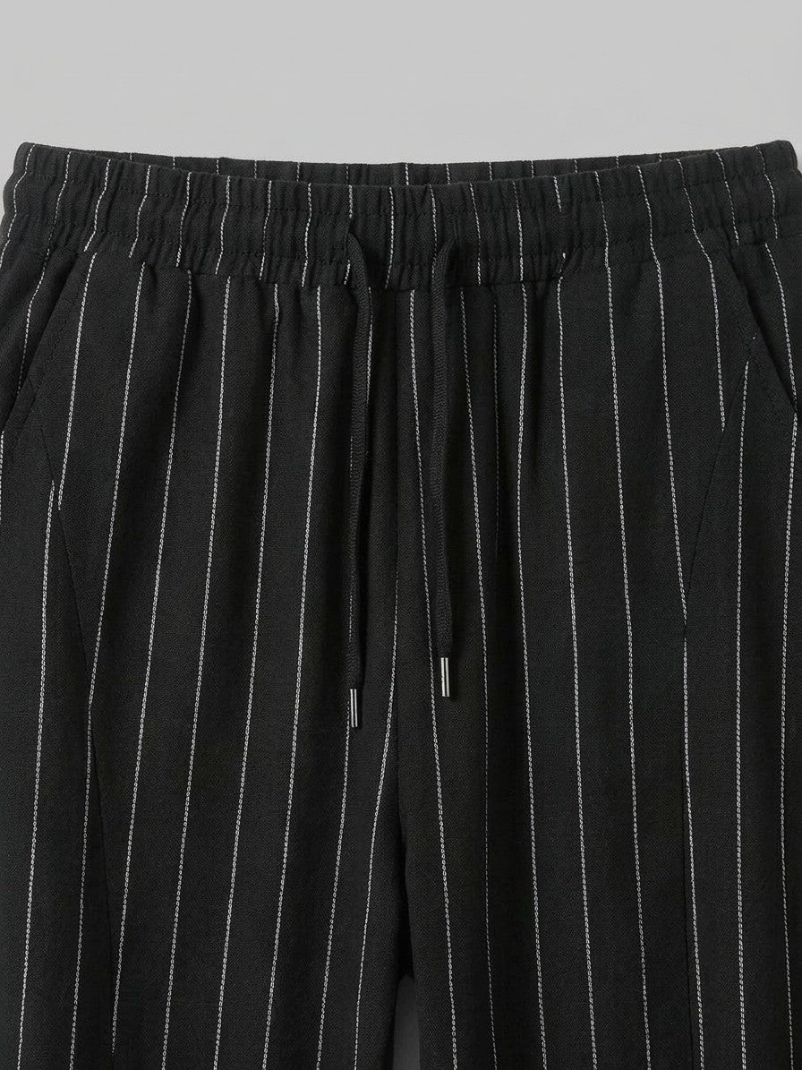 Varen Men's Pinstripe Drawstring Trousers — black — detail-collar