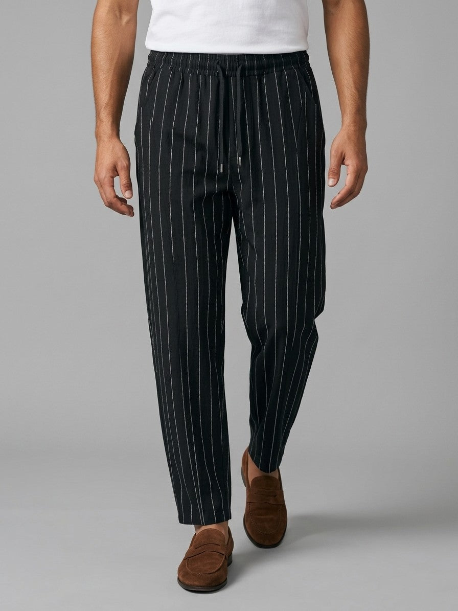 Varen Men's Pinstripe Drawstring Trousers — black — front